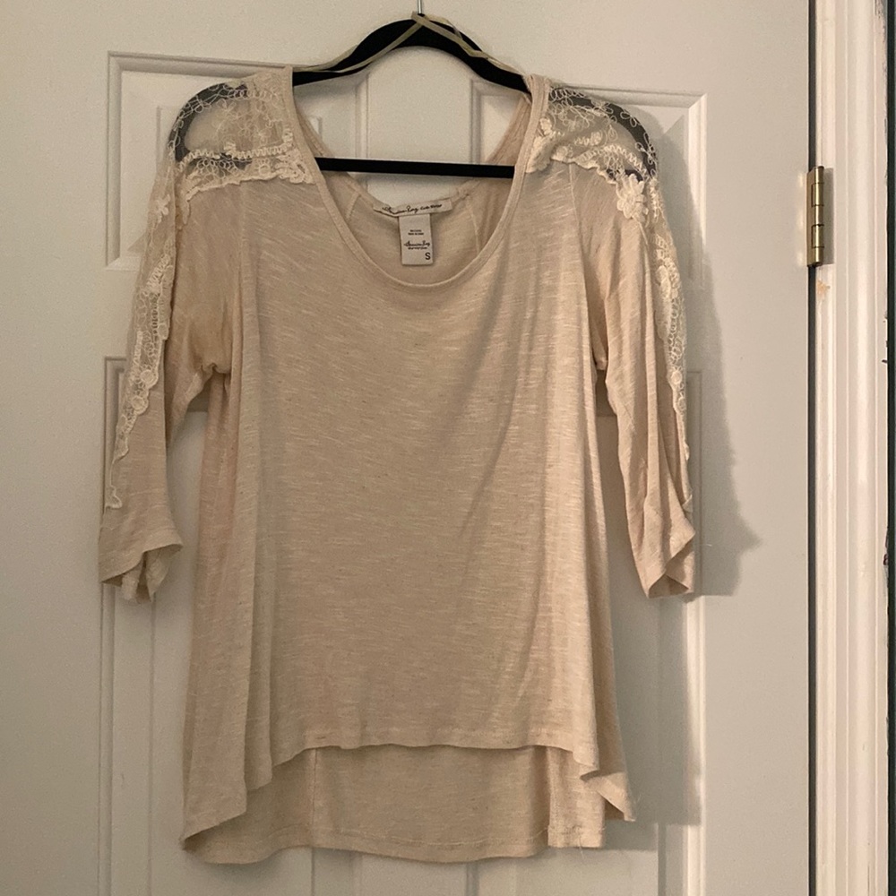 Cream three quarter length sleeve